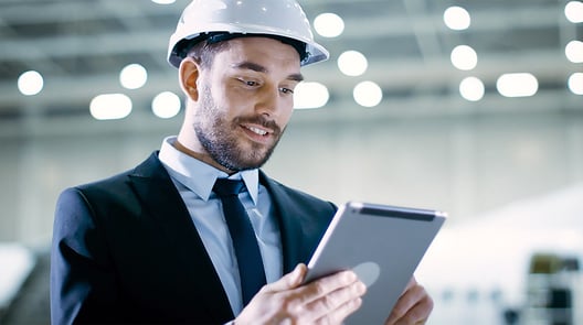 Man-with-helmet-on-tablet